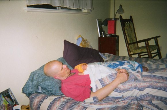070517_Gabe_sleeping_on_Papa